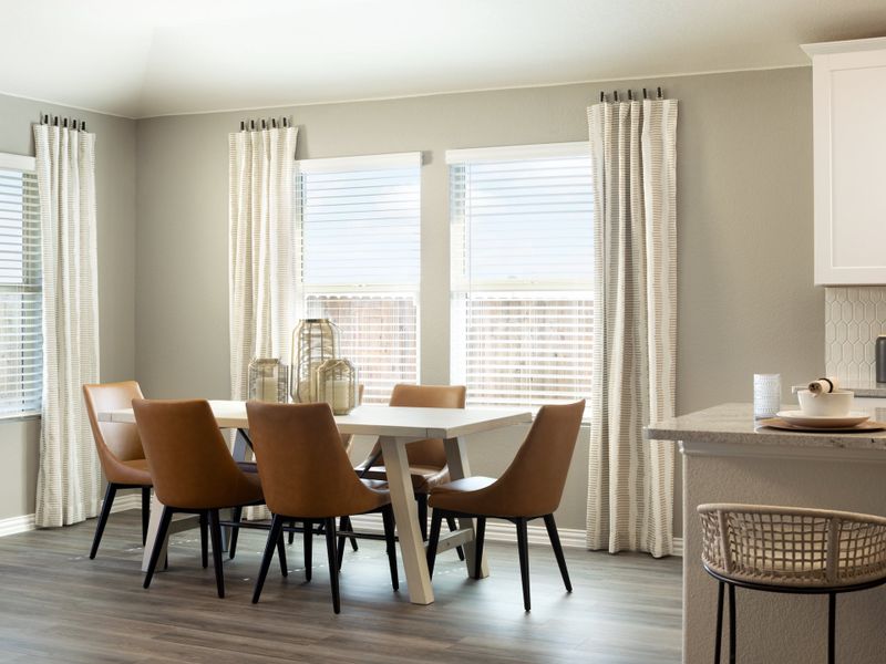 Furnished interior in a model home at River Ridge in Crandall (Image 11).