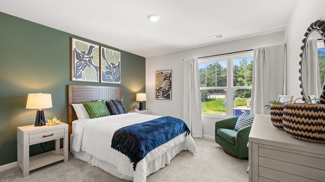 Furnished interior in a model home at Northwoods at Mirror Lake in Villa Rica (Image 29).