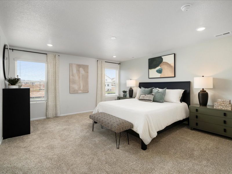 Furnished interior in a model home at Frontier Estates - The Trails Collection in Firestone (Image 9).