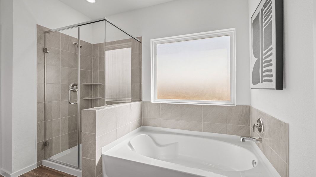 Furnished interior in a model home at Sunterra Lakes in Brookshire (Image 14).