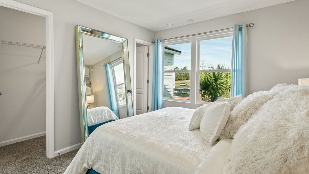 Furnished interior in a model home at Stokes Landing Express in St. Augustine (Image 19).