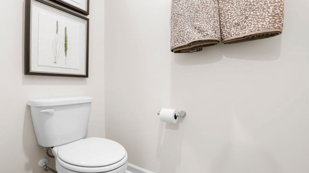 Furnished interior in a model home at Benjamin's Grove in Woodruff (Image 29).