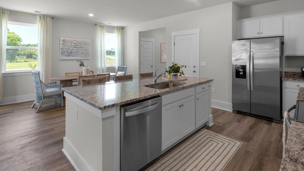 Furnished interior in a model home at Surfside Landing in Hubert (Image 6).