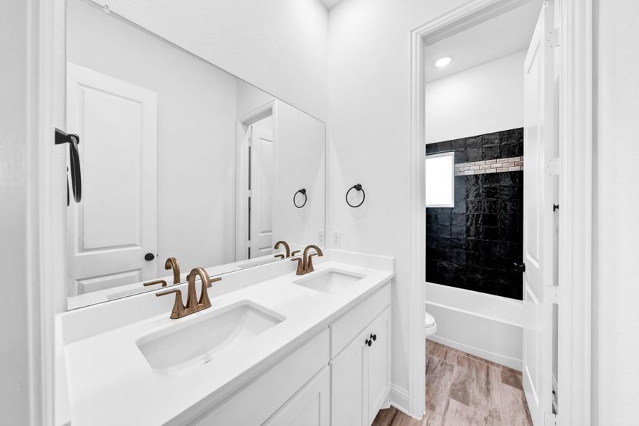 Furnished interior in a model home at Panther Trail in Van Alstyne (Image 33).