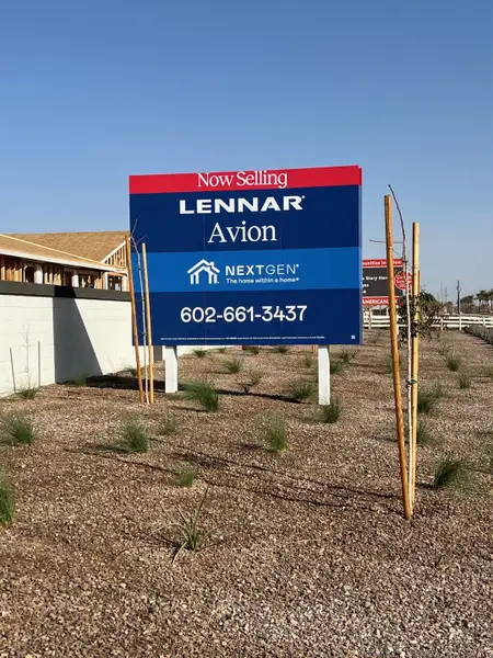New homes under construction with a sales sign in Avion: Arbor by Lennar, Goodyear, AZ.