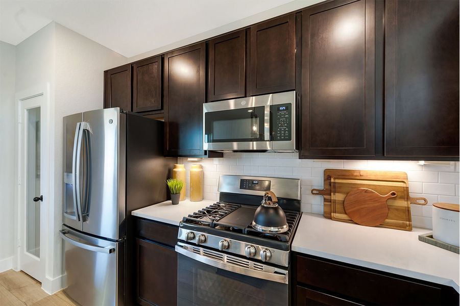 Furnished interior in a model home at Heartland in Crandall (Image 9).