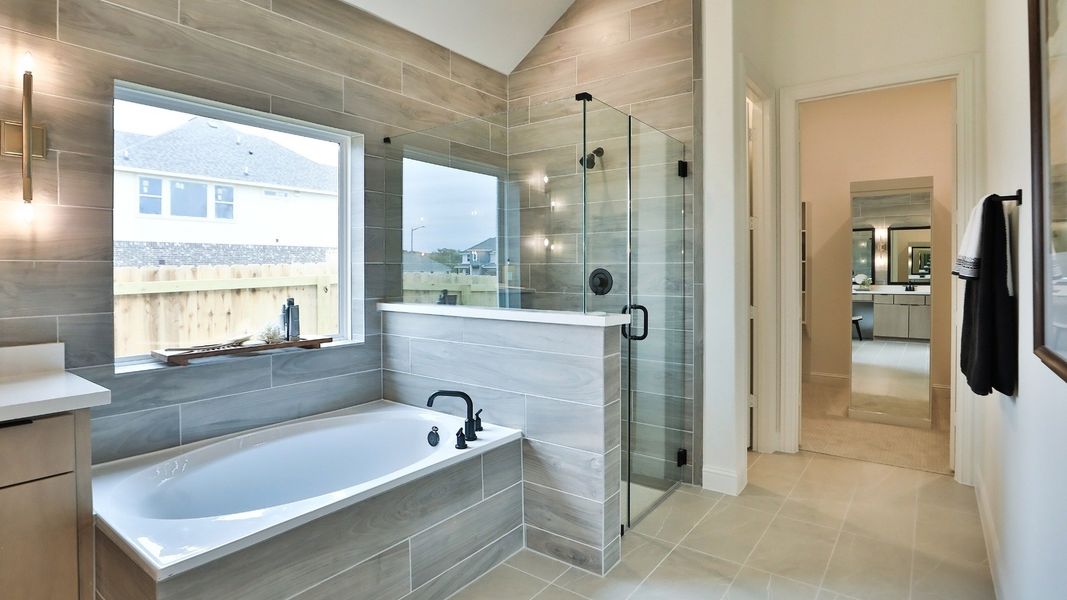 Furnished interior in a model home at Wildrye in Waller (Image 7).