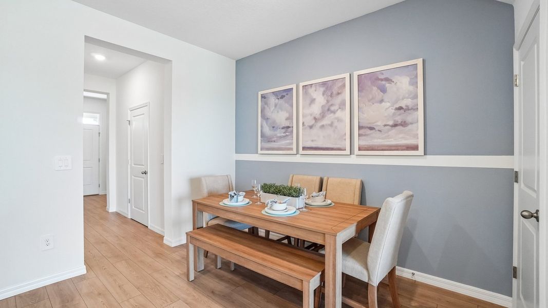 Furnished interior in a model home at Sanctuary at Citrus Park Townhomes in Tampa (Image 16).