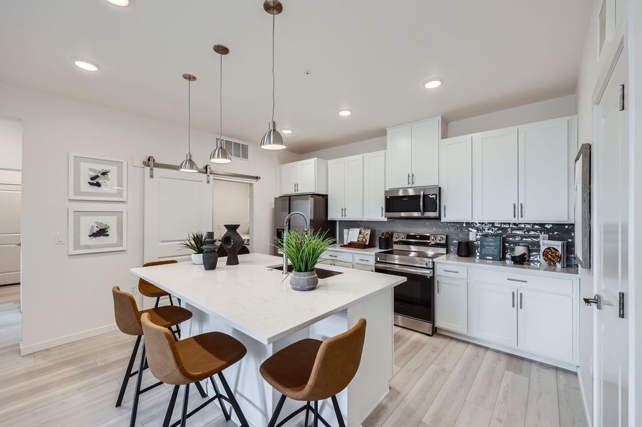 Furnished interior in a model home at The Residences at Victory Ridge in Colorado Springs (Image 5). Furnished interior in a model home at The Residences at Victory Ridge in Colorado Springs (Image 5).
