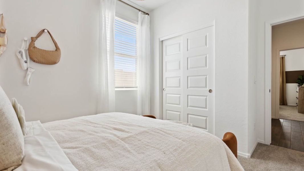 Furnished interior in a model home at Moonlight in Maricopa (Image 26).