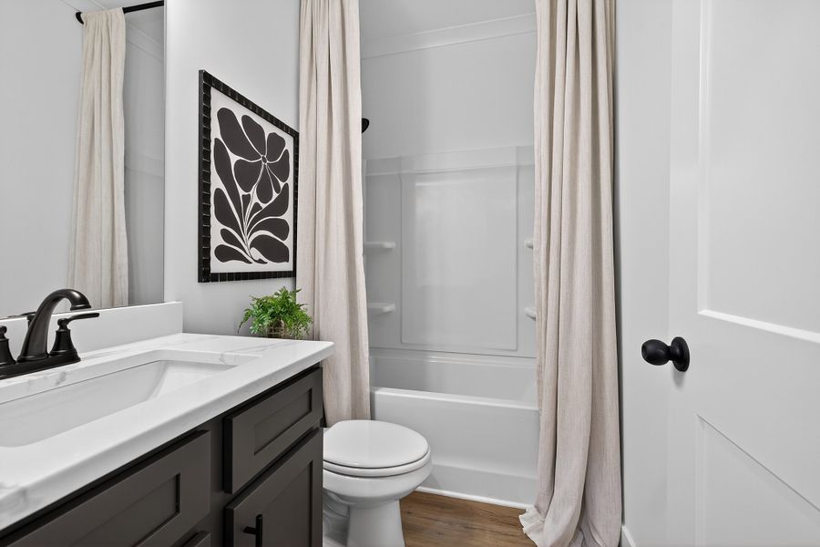 Furnished interior in a model home at Cotton Creek in Good Hope (Image 18).