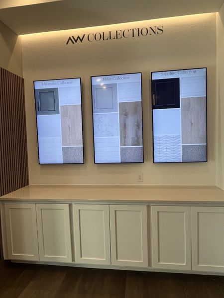 A modern interior display with three design boards showcasing the Minimalist, Milan, and Sapphire collections.