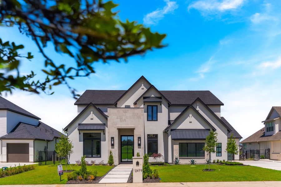 Front exterior of a home in the Enchanted Creek community, located in Lucas, TX (Image 14).