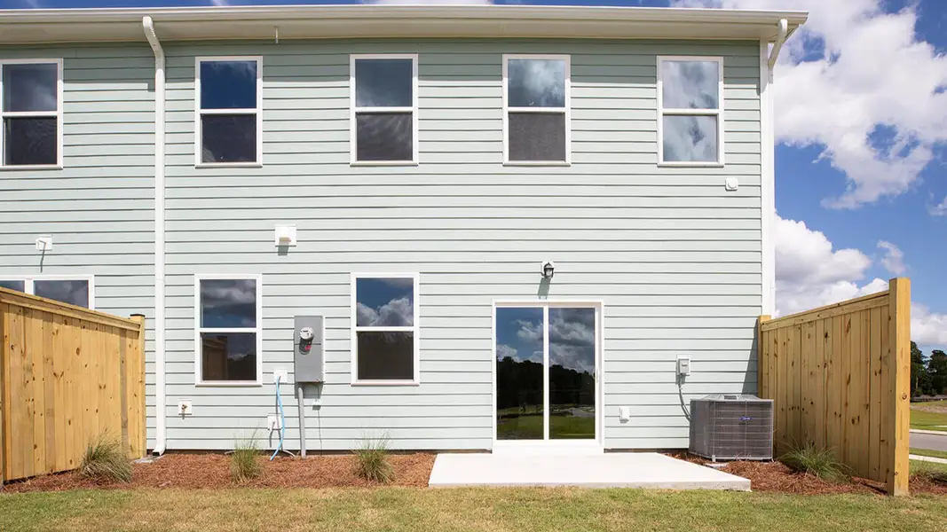 Exterior details of a home in The Palms at Indigo Preserve Townhomes, Leland (Image 5).