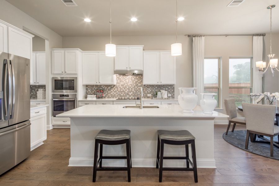 Furnished interior in a model home at Oaks at San Gabriel in Georgetown (Image 9).