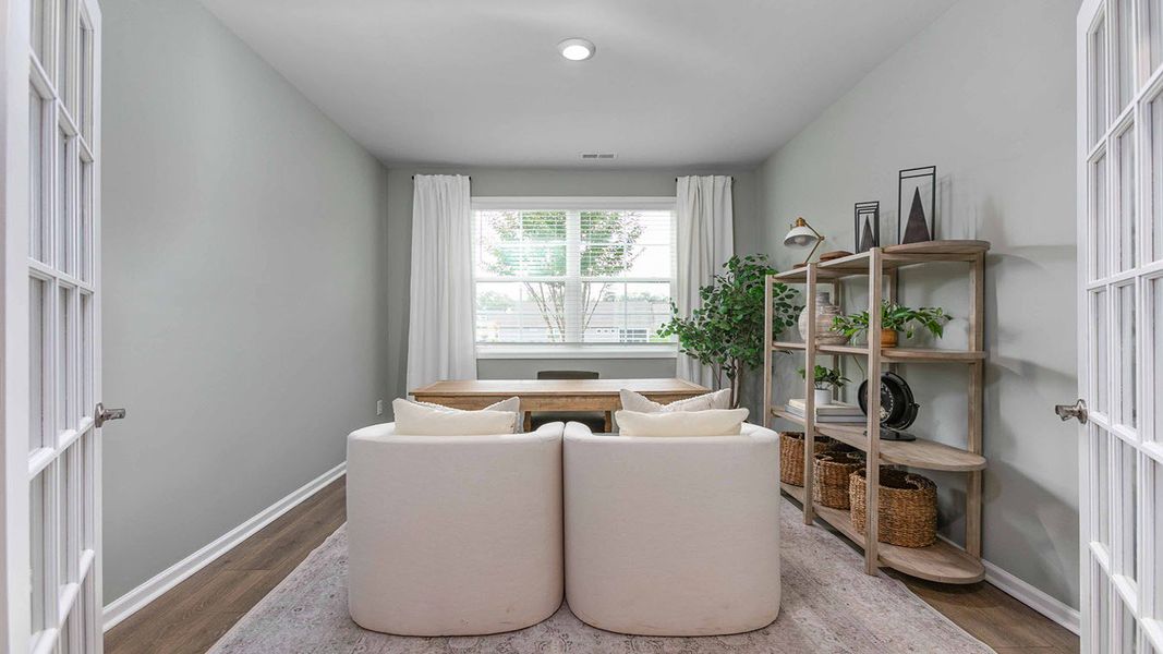 Furnished interior in a model home at The Villas at Kinsley in Jamestown (Image 9).