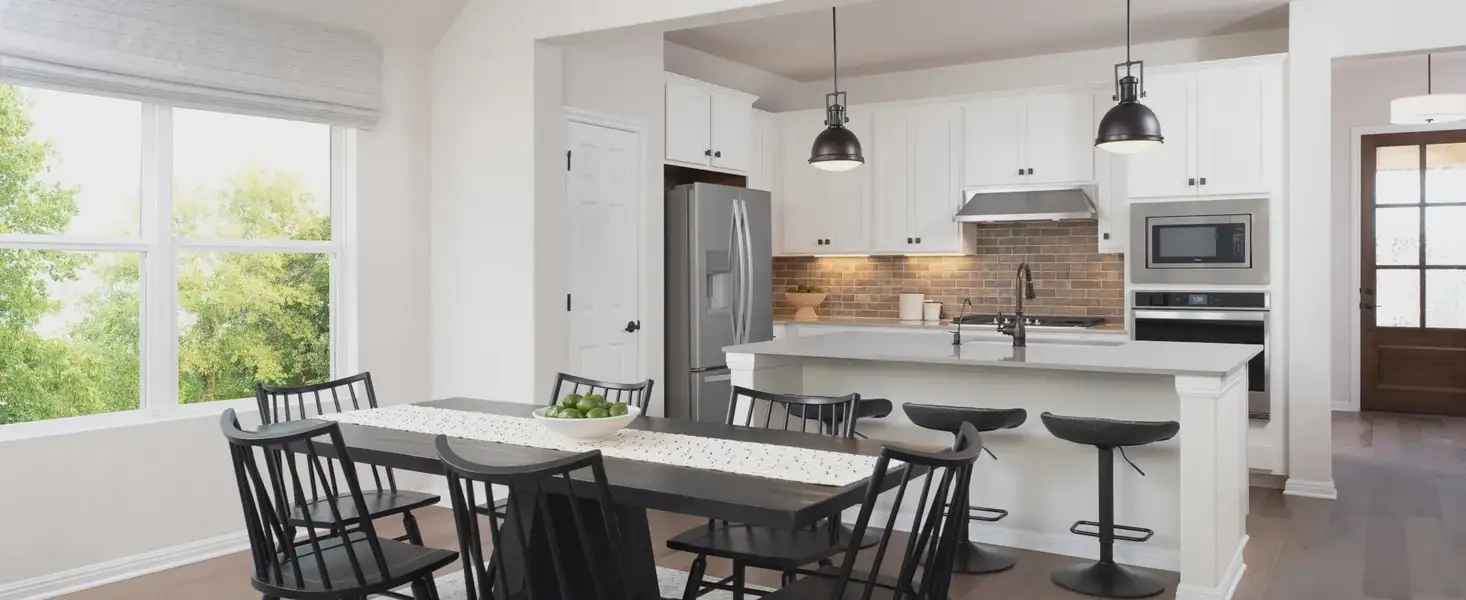 Furnished interior in a model home at Berry Creek Highlands in Georgetown (Image 13).