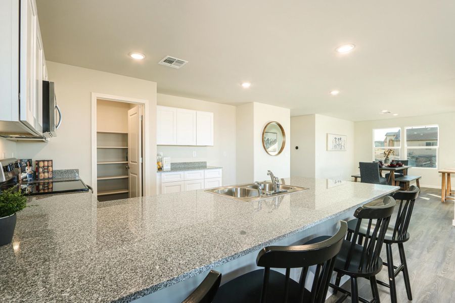 A kitchen with a large island.