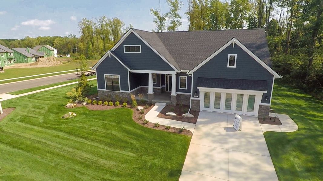 Front exterior of a home in the Preserve at Magnolia Park community, located in Jackson, MI (Image 4). Front exterior of a home in the Preserve at Magnolia Park community, located in Jackson, MI (Image 4).