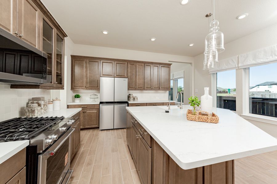 Furnished interior in a model home at Sienna in Missouri City (Image 6).