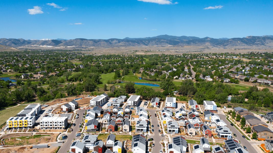Aerial view of the Geos community in Arvada, CO, showing layout and nearby surroundings (Image 16). Aerial view of the Geos community in Arvada, CO, showing layout and nearby surroundings (Image 16).