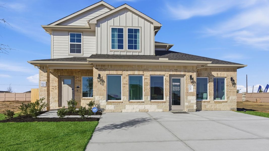 Front exterior of a home in the Caldwell Crossing community, located in Iowa Colony, TX (Image 9).