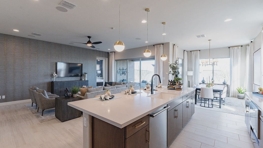 Experience luxury in this Arroyo Seco residence with custom cabinetry, sleek countertops, and expansive windows. Experience luxury in this Arroyo Seco residence with custom cabinetry, sleek countertops, and expansive windows.