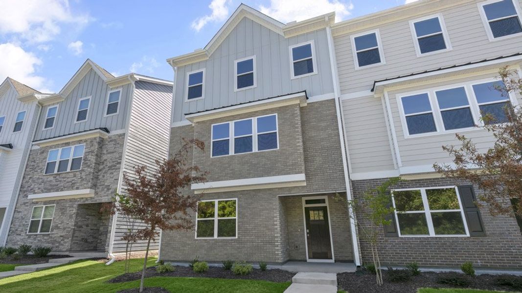 Front exterior of a home in the The Townes at Madden West community, located in Fuquay Varina, NC (Image 16).