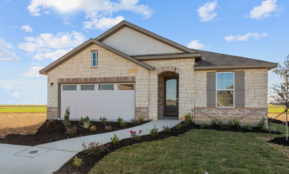 Front exterior of a home in the Saddle Creek Ranch community, located in Cibolo, TX (Image 11).