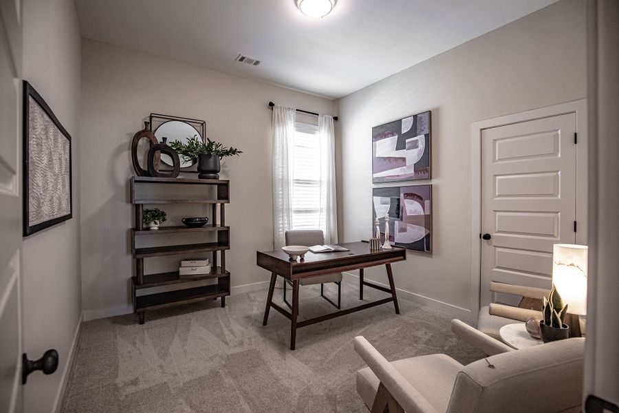 Furnished interior in a model home at Amherst in Cordova (Image 29).