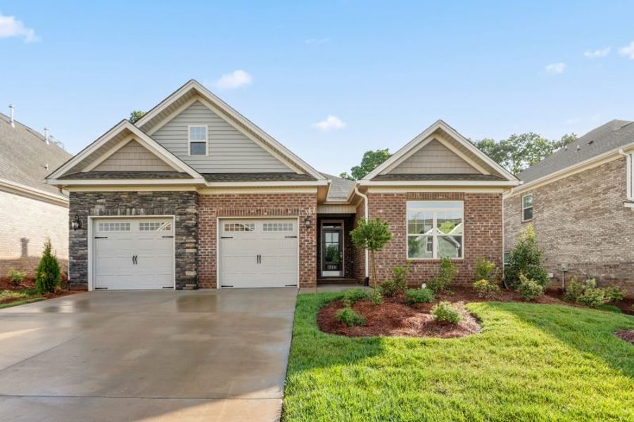 Front exterior of a home in the Weybridge community, located in Burlington, NC (Image 52).