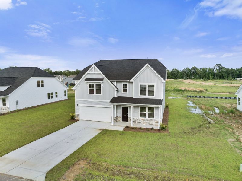 Front exterior of a home in the Pandora's Path community, located in Florence, SC (Image 3). Front exterior of a home in the Pandora's Path community, located in Florence, SC (Image 3).
