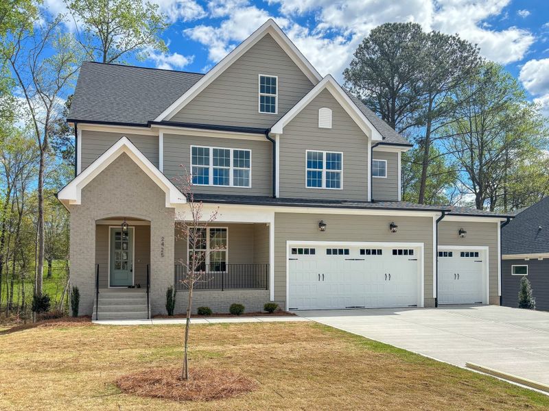 Front exterior of a home in the Forest Bluff Estates community, located in Fuquay Varina, NC (Image 11). Front exterior of a home in the Forest Bluff Estates community, located in Fuquay Varina, NC (Image 11).