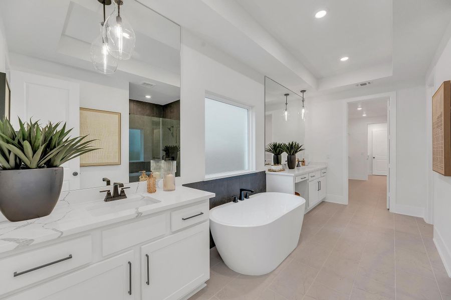 Furnished interior in a model home at The Colony - 50' in Bastrop (Image 28).