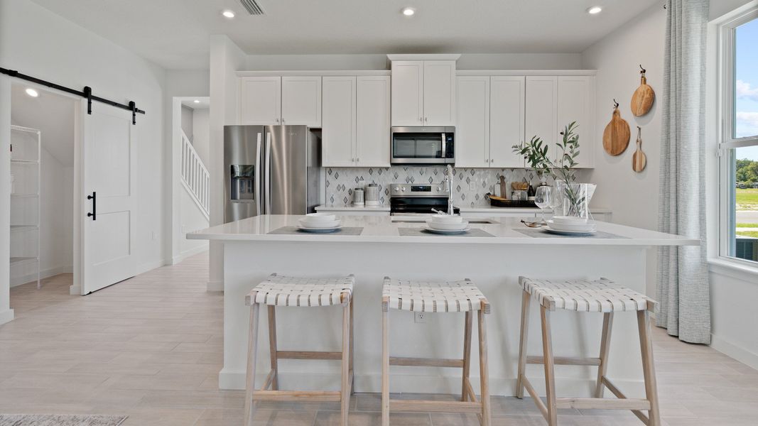 Trinity Place Staged Model Ambersweet Kitchen by DRB Homes in Saint Cloud FL Trinity Place Staged Model Ambersweet Kitchen by DRB Homes in Saint Cloud FL