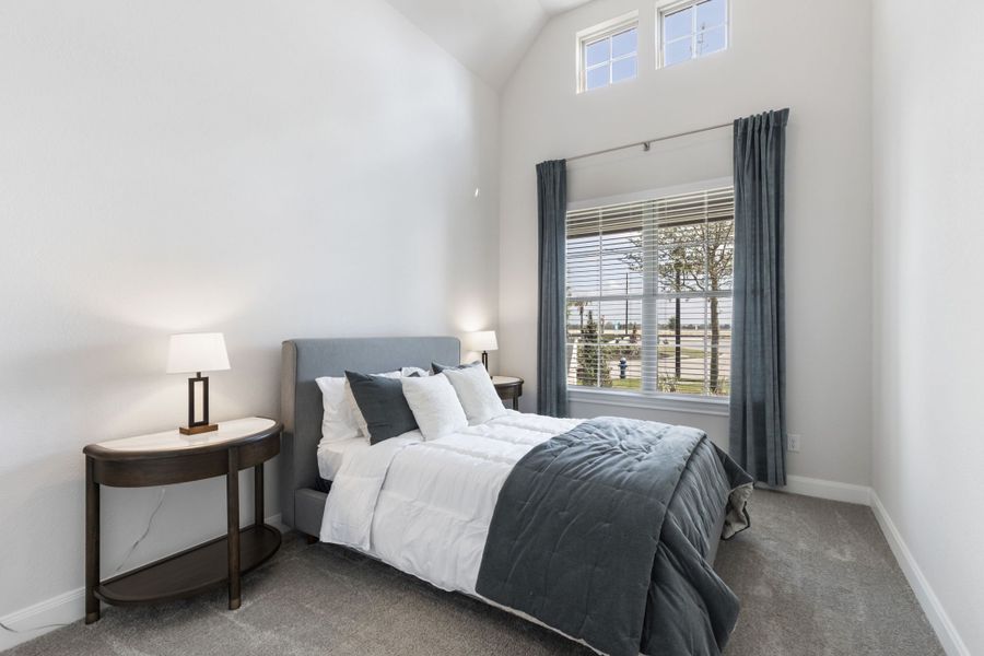 Furnished interior in a model home at Sunterra in Katy (Image 26).