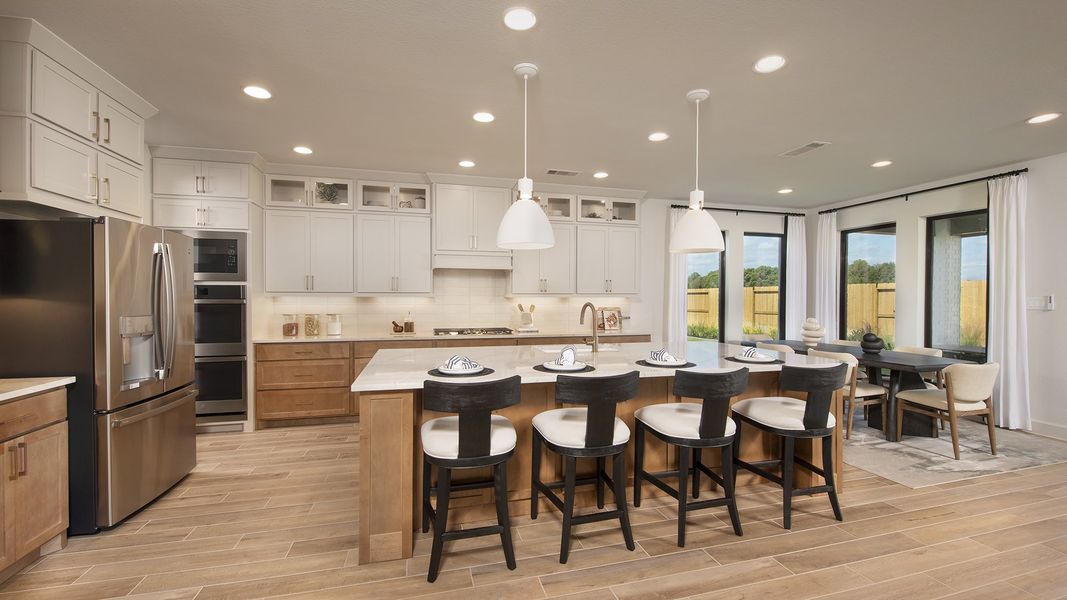 Furnished interior in a model home at Cross Creek West 55' in Fulshear (Image 10).