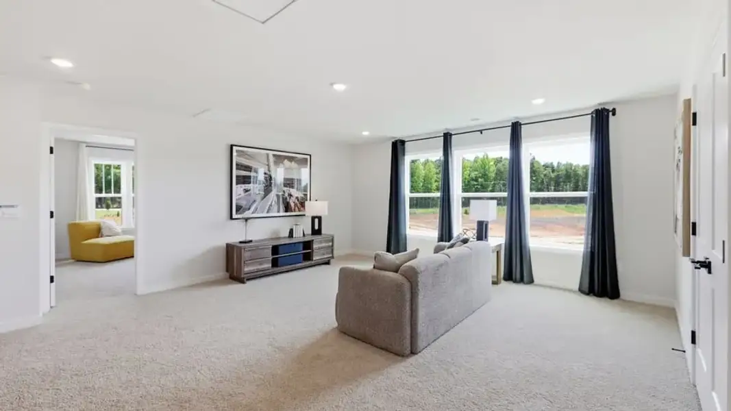 Furnished interior in a model home at Spring Ridge Reserve in Anderson (Image 28).