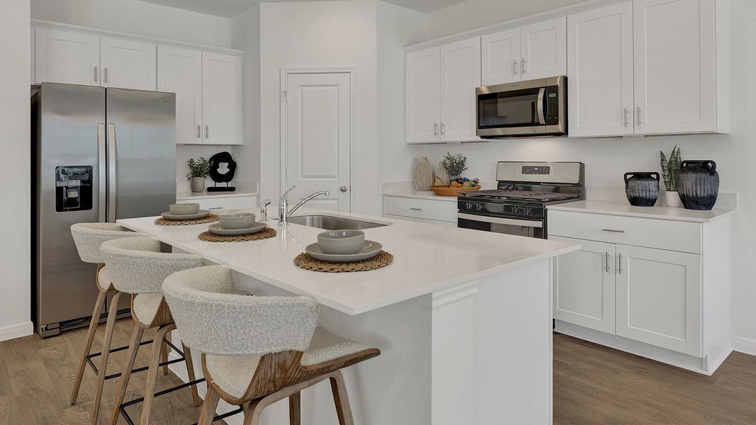 Furnished interior in a model home at Paramount in Kyle (Image 6).