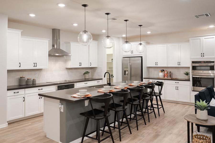 Furnished interior in a model home at Ryder Ranch in Surprise (Image 39).