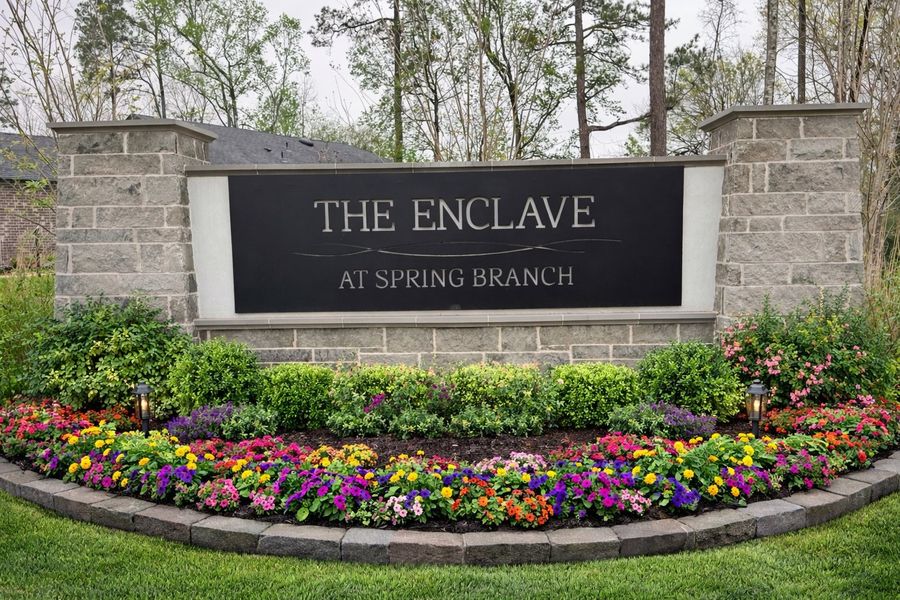 Entrance to the The Enclave at Spring Branch community in Conroe, TX, featuring signage and landscaping (Image 1). Entrance to the The Enclave at Spring Branch community in Conroe, TX, featuring signage and landscaping (Image 1).