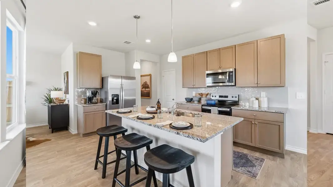 Furnished interior in a model home at Saddle Ridge Estates in Lytle (Image 12).