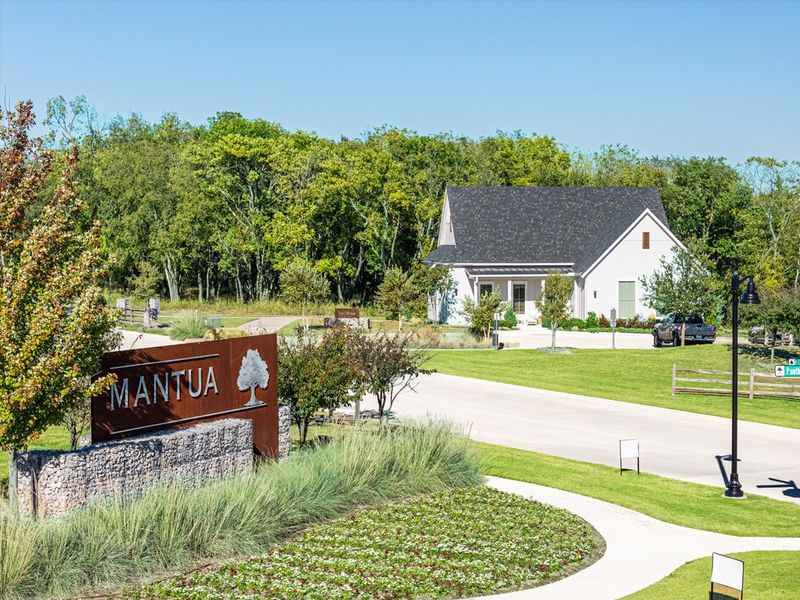 Entrance to the Mantua Point: 55ft. lots community in Van Alstyne, TX, featuring signage and landscaping (Image 12).