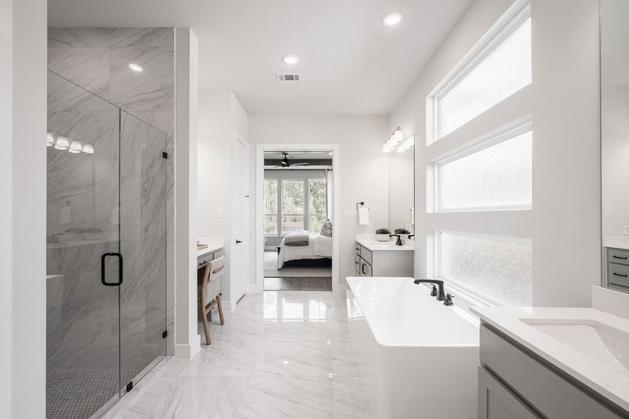 Furnished interior in a model home at Sienna 60’ in Missouri City (Image 25).