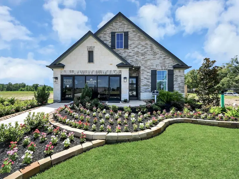 Front exterior of a home in the Enclave at Newport community, located in Crosby, TX (Image 5).
