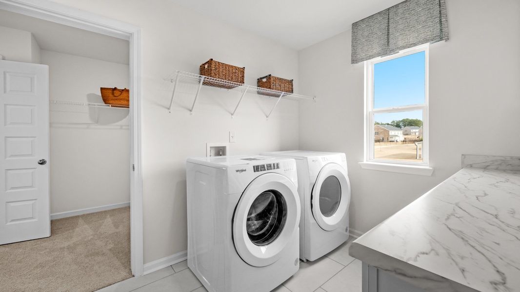 Furnished interior in a model home at Westland in Bogart (Image 14).