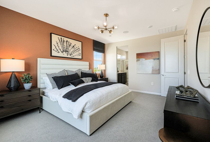 A bedroom with a bed and lamps. A bedroom with a bed and lamps.
