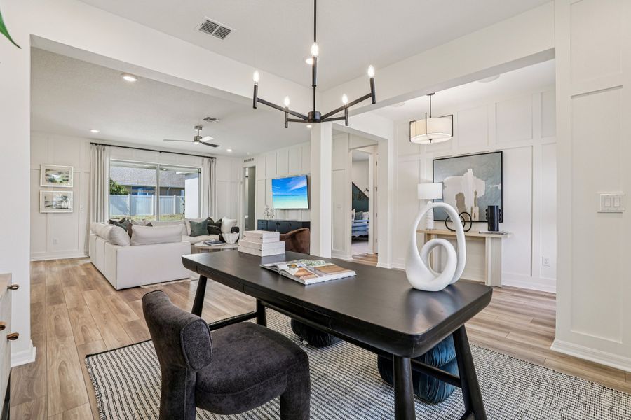 Furnished interior in a model home at Country Club Estates in Palm Bay (Image 7).