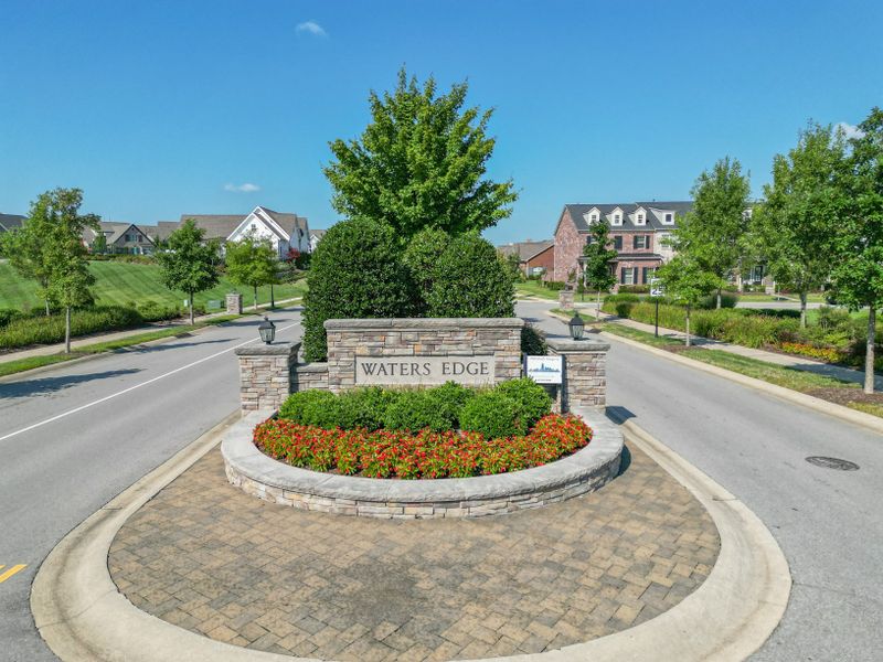 Entrance to the Waters Edge community in Franklin, TN, featuring signage and landscaping (Image 2).