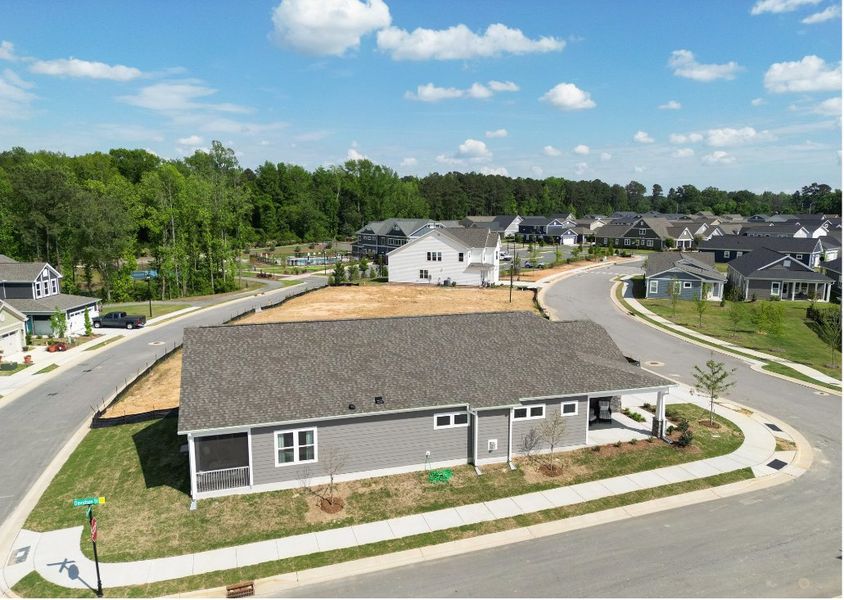 Aerial view of the The Walk at East Village community in Clayton, NC, showing layout and nearby surroundings (Image 14). Aerial view of the The Walk at East Village community in Clayton, NC, showing layout and nearby surroundings (Image 14).